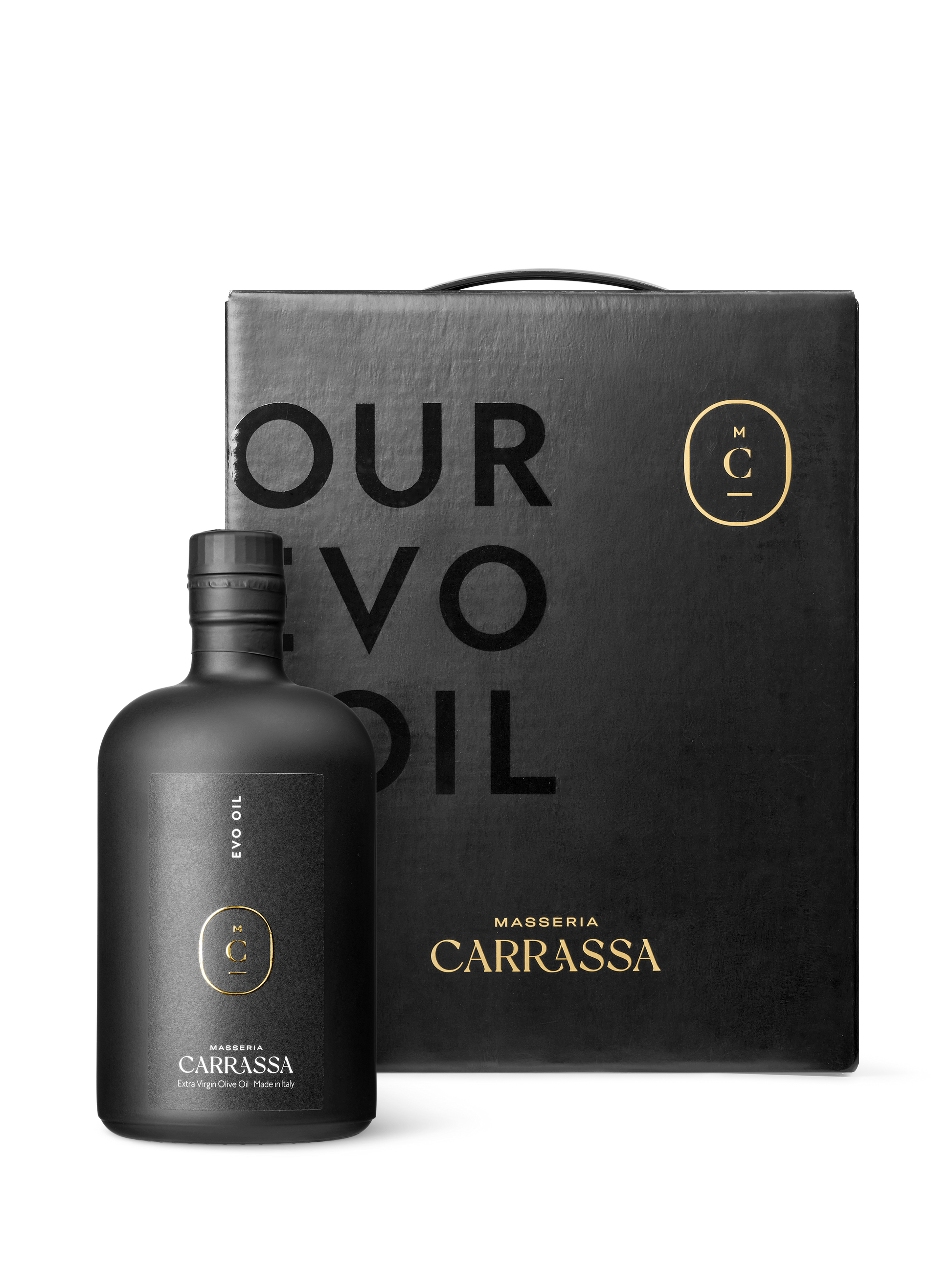Masseria Carrassa olive oil bottle beside matching black gift box